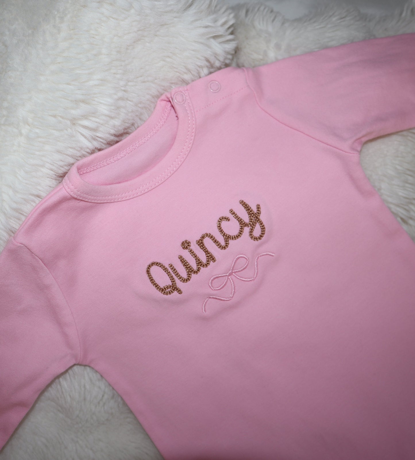 Signature Bow Onesie
